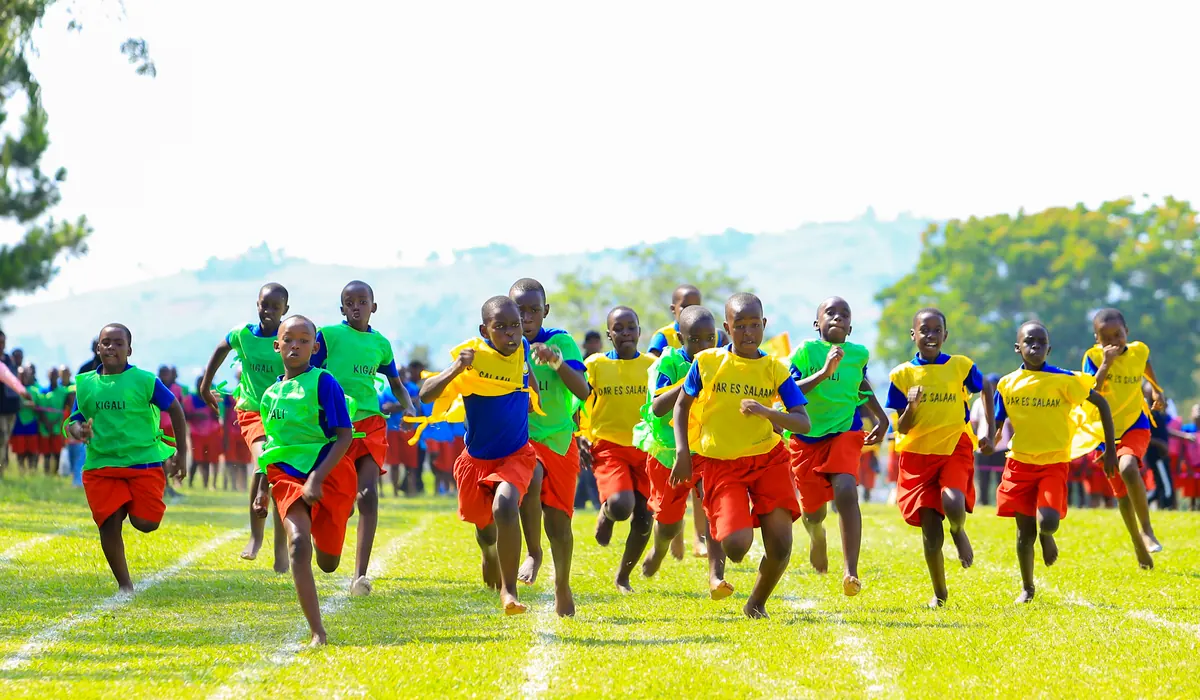 Pupils sprinting down the track on sports day
