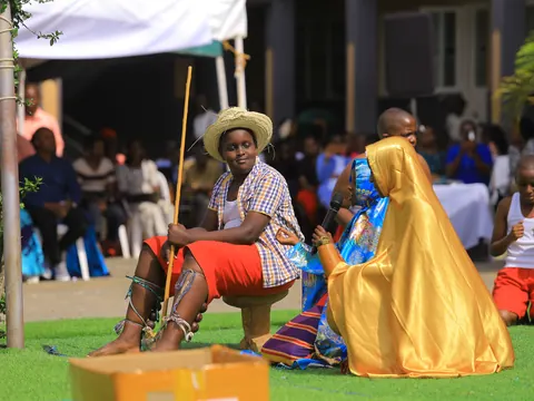 Pupils performing a traditional drama